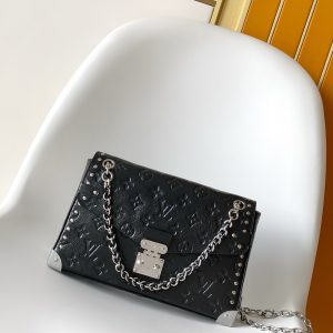 p720•Coated canvas•Cowhide leather trim•Fabric lining•Metal hardware•Flap closure with S-lock buckle•Zippered interior pocket•Holds 6.7-inch smartphone, Sarah long wallet, notebook, sunglasses, and keys•Chain: Non-removable•Chain length: 28.0 cm